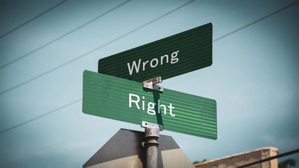 Señal de calle a lo correcto versus lo incorrecto
 - Foto, Imagen