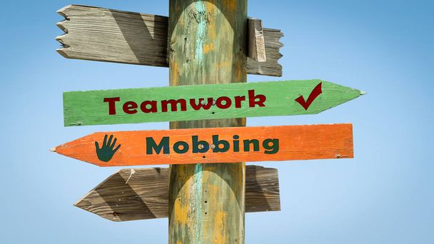 Sinal de rua para o trabalho em equipe versus Mobbing
 - Foto, Imagem