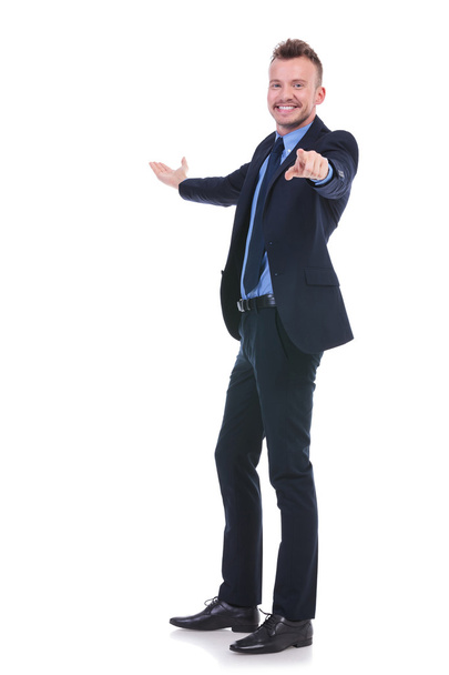 business man presents and points at you - Фото, изображение