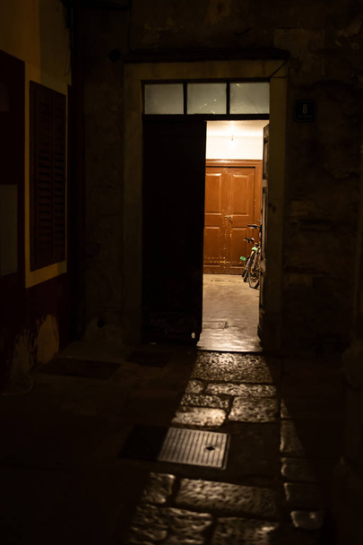 Open door in the city of Cres on an evening in spring - Zdjęcie, obraz