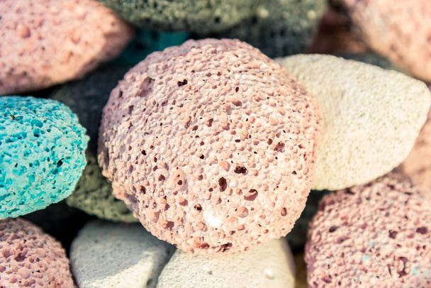 Multi-colored pumice stones for the whole frame. Selective focus - Photo, Image
