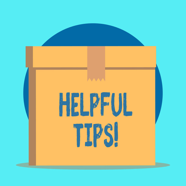 Writing note showing Helpful Tips. Business photo showcasing advices given to be helpful knowledge in life Rectangular equal size hard carton cardboard with irregular zigzag tape. - Photo, Image