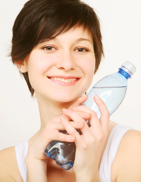 woman with bottle of clean water  - Fotó, kép