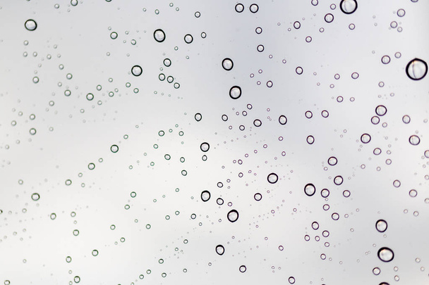 Raindrops on window glasses surface - Фото, изображение