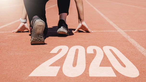 2020 Newyear, Athlete Woman starting on line for start running
  - Фото, изображение
