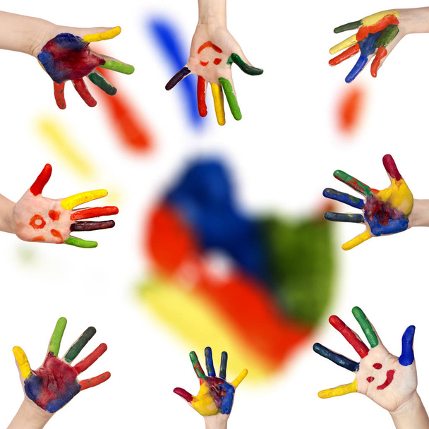 Children's smiling colorful hands raised up. The concept of clas - Fotó, kép