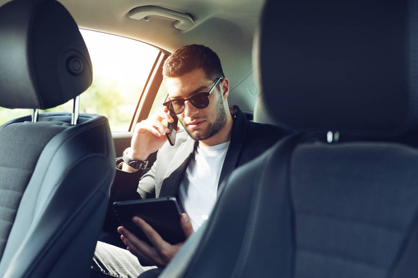 Businessman Talking Using Phone Car Inside  - Фото, зображення