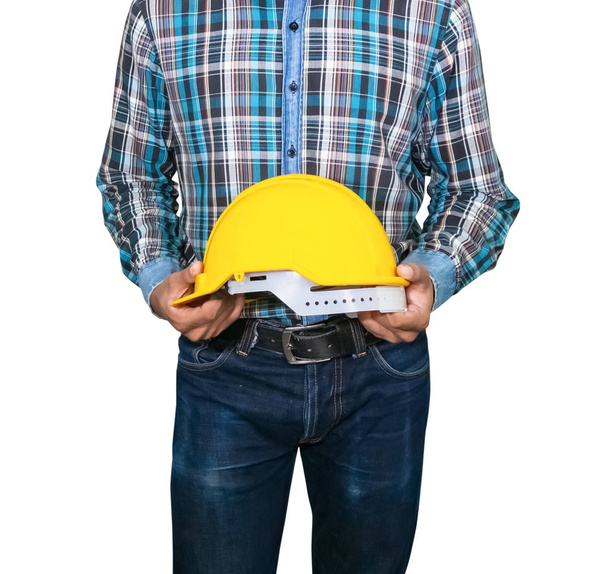 Ingeniero de negocios sostiene casco de seguridad amarillo plástico sobre fondo blanco
 - Foto, imagen