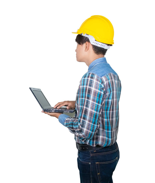 Engineer while holding using Laptop on white background - Fotoğraf, Görsel