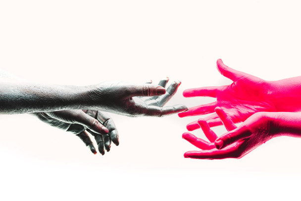 Communication concept, metaphor for human hands and souls, request and help, desire to understand each other. Psychology of communication and contact. Beautiful colored hands - Photo, Image