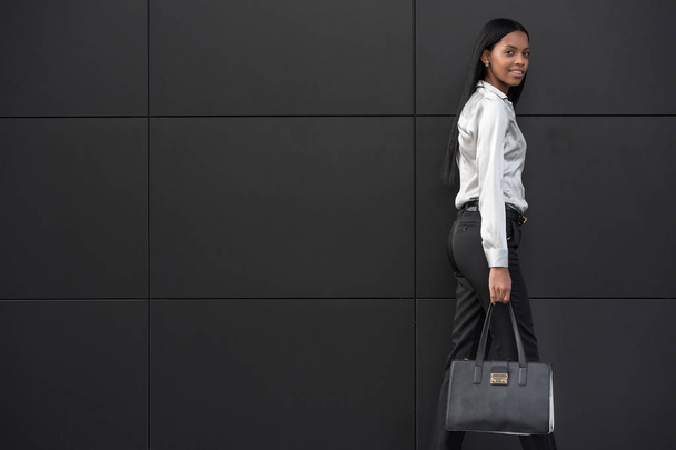 Portrait of young mixed race latina businesswoman in modern business district   - Fotoğraf, Görsel