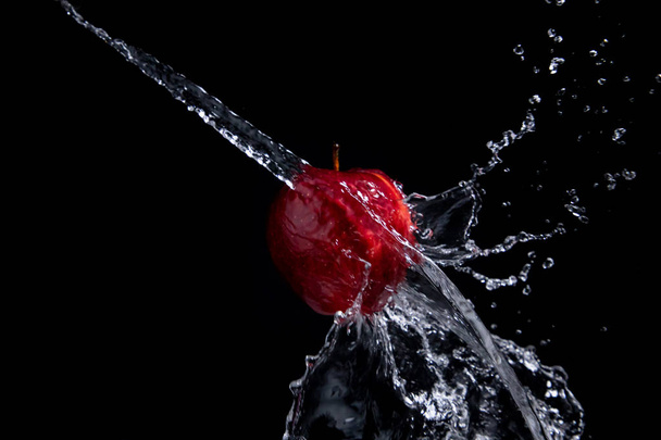 red apple splash on black background - Fotoğraf, Görsel