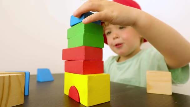 Little child playing with blocks - Footage, Video