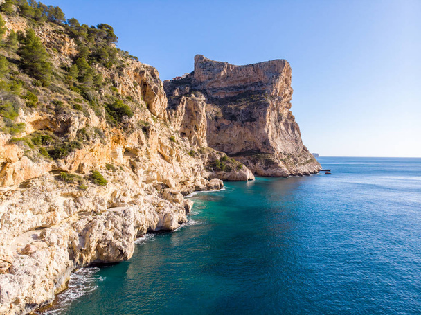 Cliffs in Moraig cove beach in Benitatxell, Alicante, Spain - Photo, Image