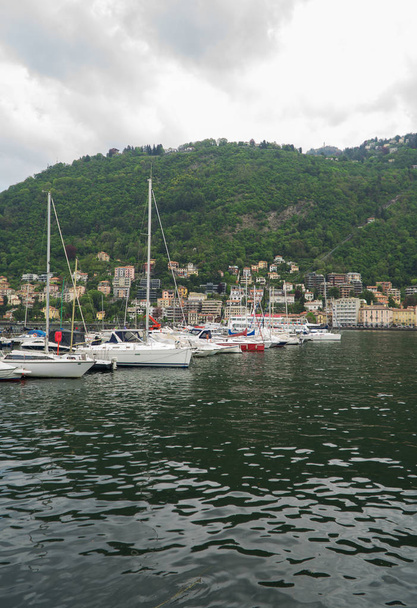 Many yachts and boats in the harbor of Como, Italy. - Photo, Image