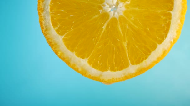 Juice Flows Down on Orange Fruit - Materiał filmowy, wideo