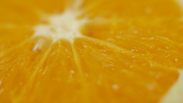 Čerstvý pomeranč plátky ovoce se otáčí - Záběry, video