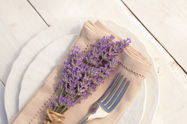 Served table set with lavender bunch - Photo, Image