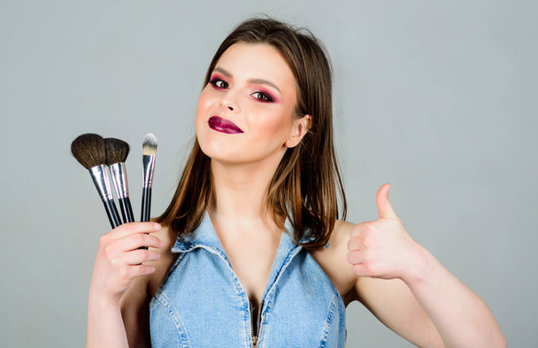 beauty hairdresser salon. Lipstick eyeshadow. sensual woman with long hair, style. sexy woman with professional make up brush. sexuality. skincare cosmetics. fashion makeup visage. woman with make up - Фото, изображение