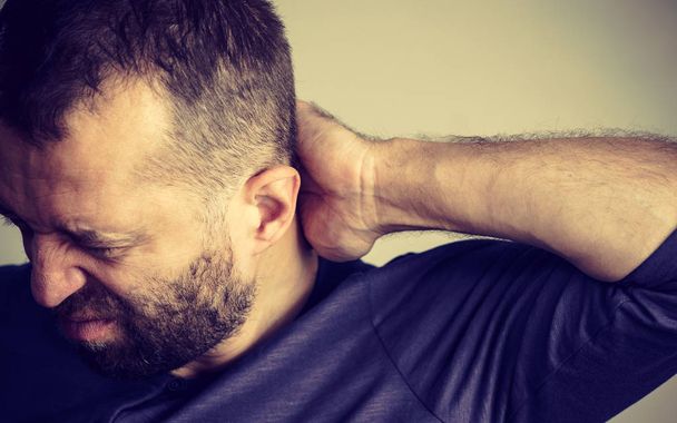 Man having neck ache - Fotografie, Obrázek