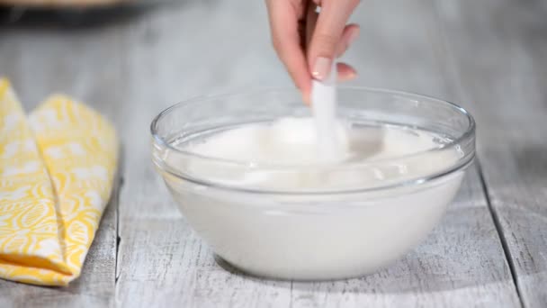 Filling whipped cream. White gentle cream. Close-up shot. - Materiaali, video