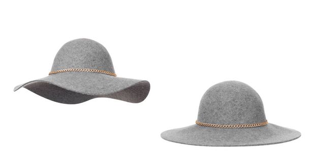 Un bel ensemble, chapeau de laine de luxe deux sortes de gris avec une décoration de chaîne d'or, automne, hiver, isolé sur fond blanc, clipping
 - Photo, image