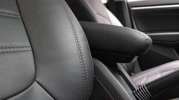 beautiful leather car interior design. faux leather front seats in the car. luxury leather seats in the car. Black leather seat covers in the car. - Photo, Image