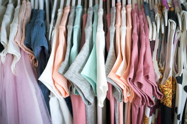 Set of clothes for kids on hangers. Shopping. - Φωτογραφία, εικόνα