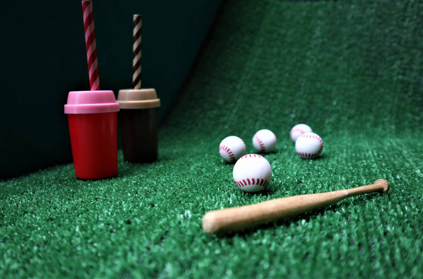 Baseball and bat on the  green grass with copy space - Foto, Bild