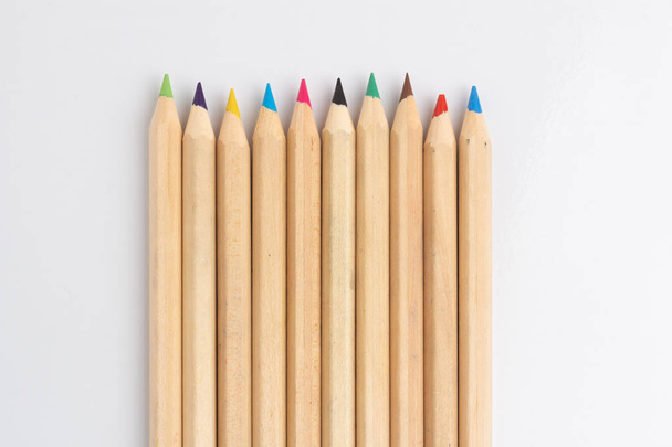 Color pencils are on the white table. - Photo, Image