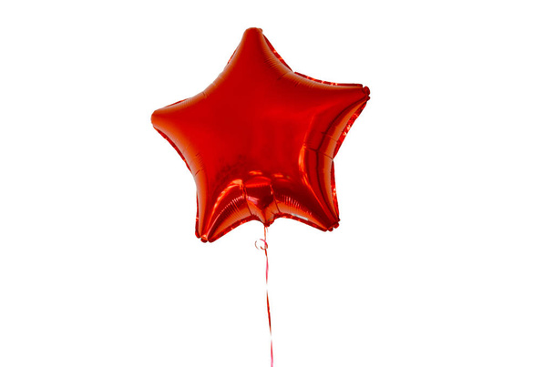 hot air balloon in the shape of a star of red color on white background isolate. - Фото, зображення