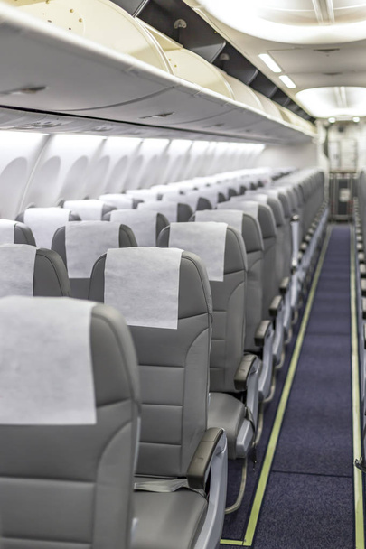 Vista prospectiva de assentos de aeronaves vazios
 - Foto, Imagem