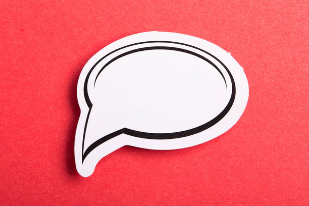 Speech Bubble Isolated On Red Background - Photo, Image