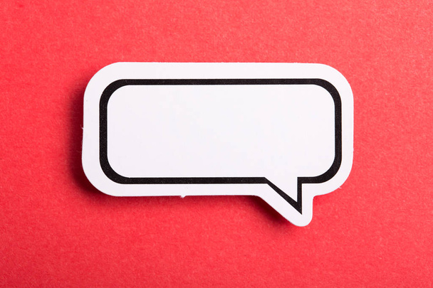 Speech Bubble Isolated On Red Background - Photo, Image