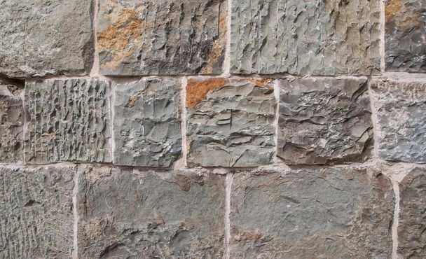 Grey and brown concrete block cobble stone texture pattern background. Close up - 写真・画像