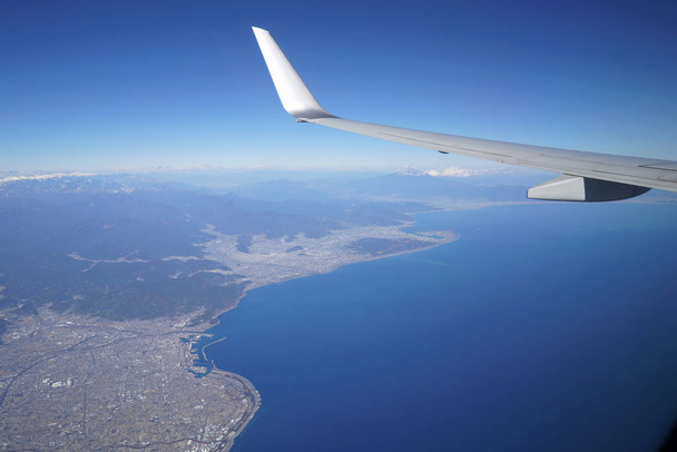 vista di ala di aereo aereo aereo e montagna di fuji, Shizuoka, Surugawan, Giappone
                                - Foto, immagini