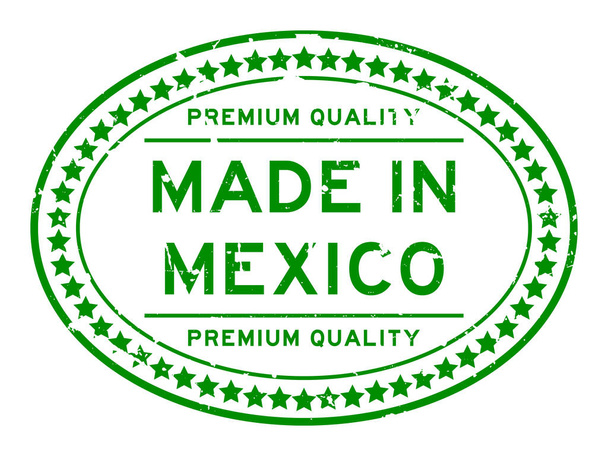 Grunge green premium quality made in Mexico oval rubber seal stamp on white  - Photo, Image