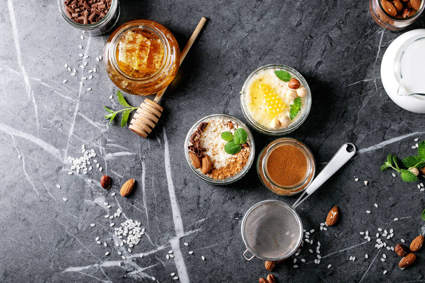 Rice pudding with honey and cinnamon - Фото, изображение