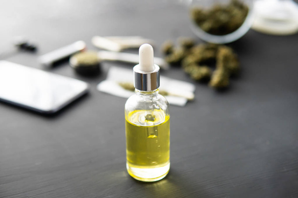 natural herb, close up, CBD cannabis OIL. hemp product, Cannabis oil in pipette, medical marijuana concept, - Φωτογραφία, εικόνα