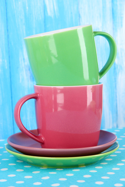 Two cups on blue background - Photo, image