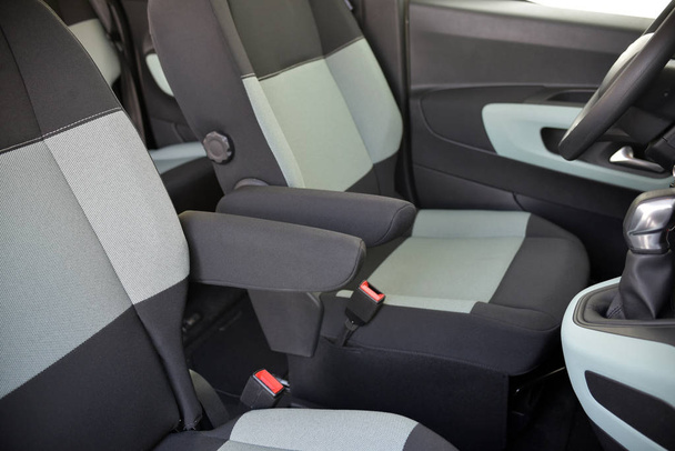 armrest in the luxury passenger car, front seats - Photo, Image