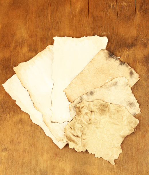 Old papers on wooden background - Φωτογραφία, εικόνα