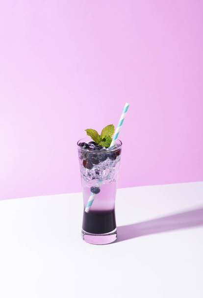 Cold and refreshing  blueberry punch cocktail with mint  - Photo, Image