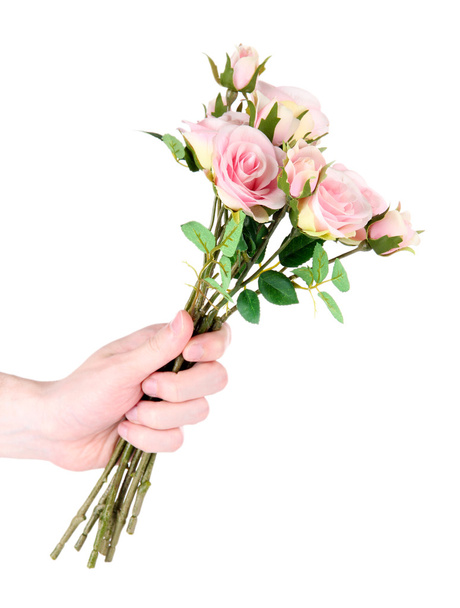 Man's hand giving a roses isolated on white - Фото, изображение