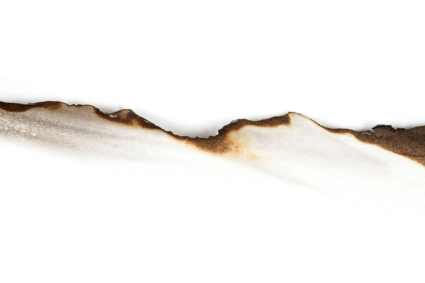 valkoisella poltettu paperi
 - Valokuva, kuva