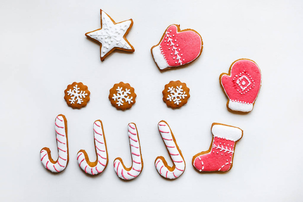 Handmade festive gingerbread cookies in the form of stars, snowf - Photo, Image