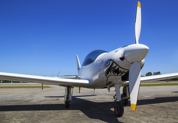 White airplane with a shark paint - Photo, Image
