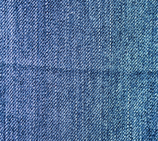 Textura Jeans tela azul, fondo de material de algodón
. - Foto, Imagen