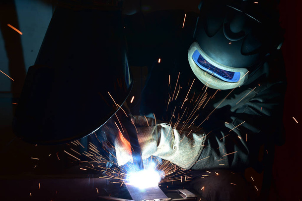 Industrial steel welder in factory welder, craftsman - Photo, Image