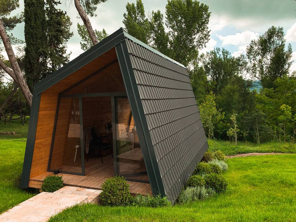 Small wooden cabin house exterior design - Photo, Image